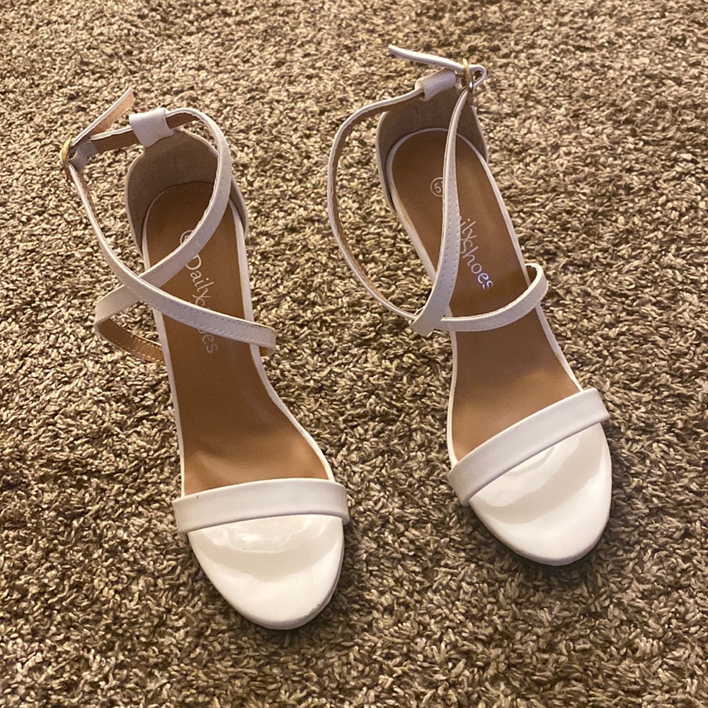 Glossy white heels. In new like condition.